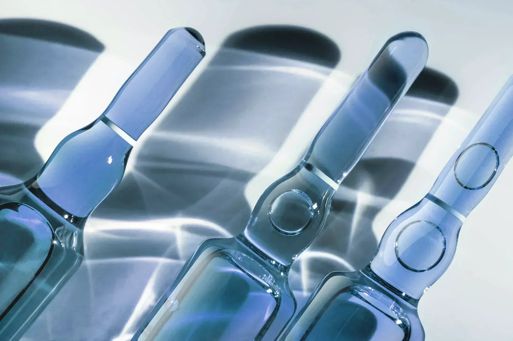 Australian cosmetic chemist working on skincare product development samples in lab